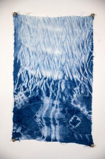 Tritik and arashi indigo dye on linen