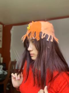 Hand woven then felted.Octopus hat